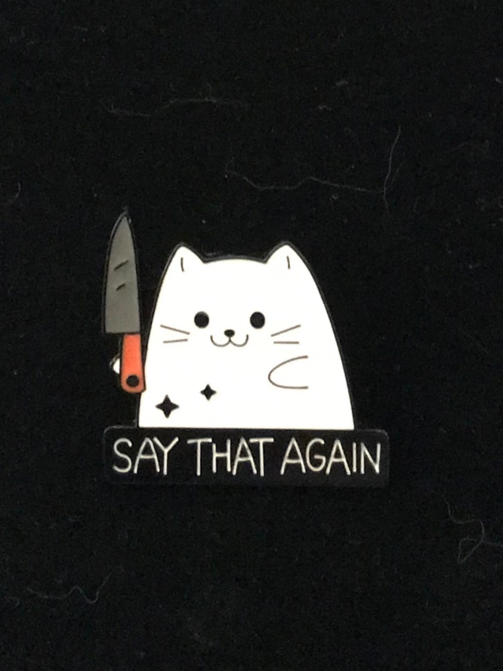 NWOT armed white cat “Say that again” pin (pins: 1/$12, 2/$20)